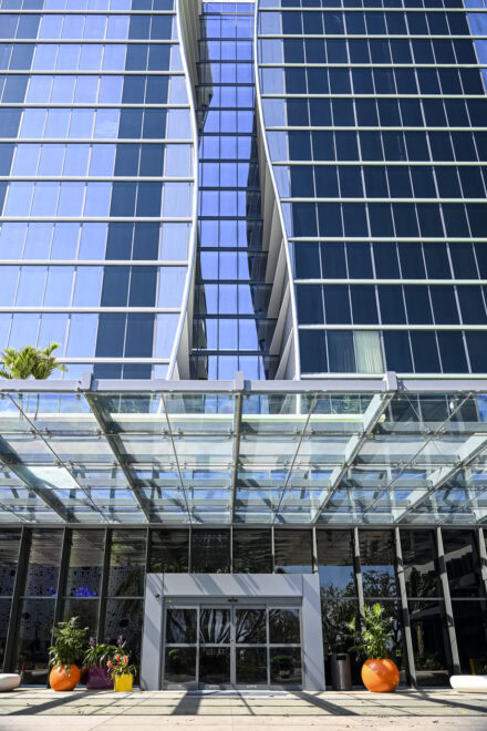 Lake Nona Wave Hotel acm panel entrance with glass canopy