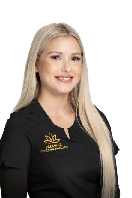 headshot of blond woman in black scrubs for a medical spa business